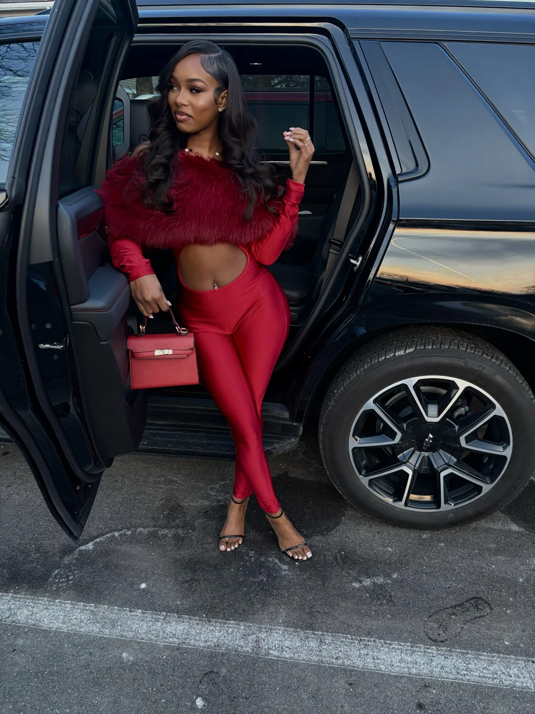 Dollish Pink customer wearing long body-wave hair in red